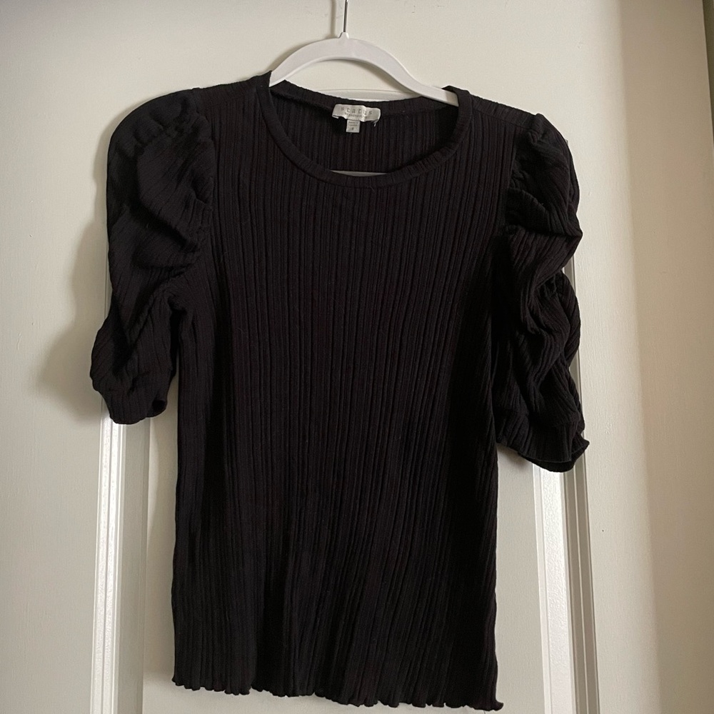 Black ribbed blouse with ruffled sleeves